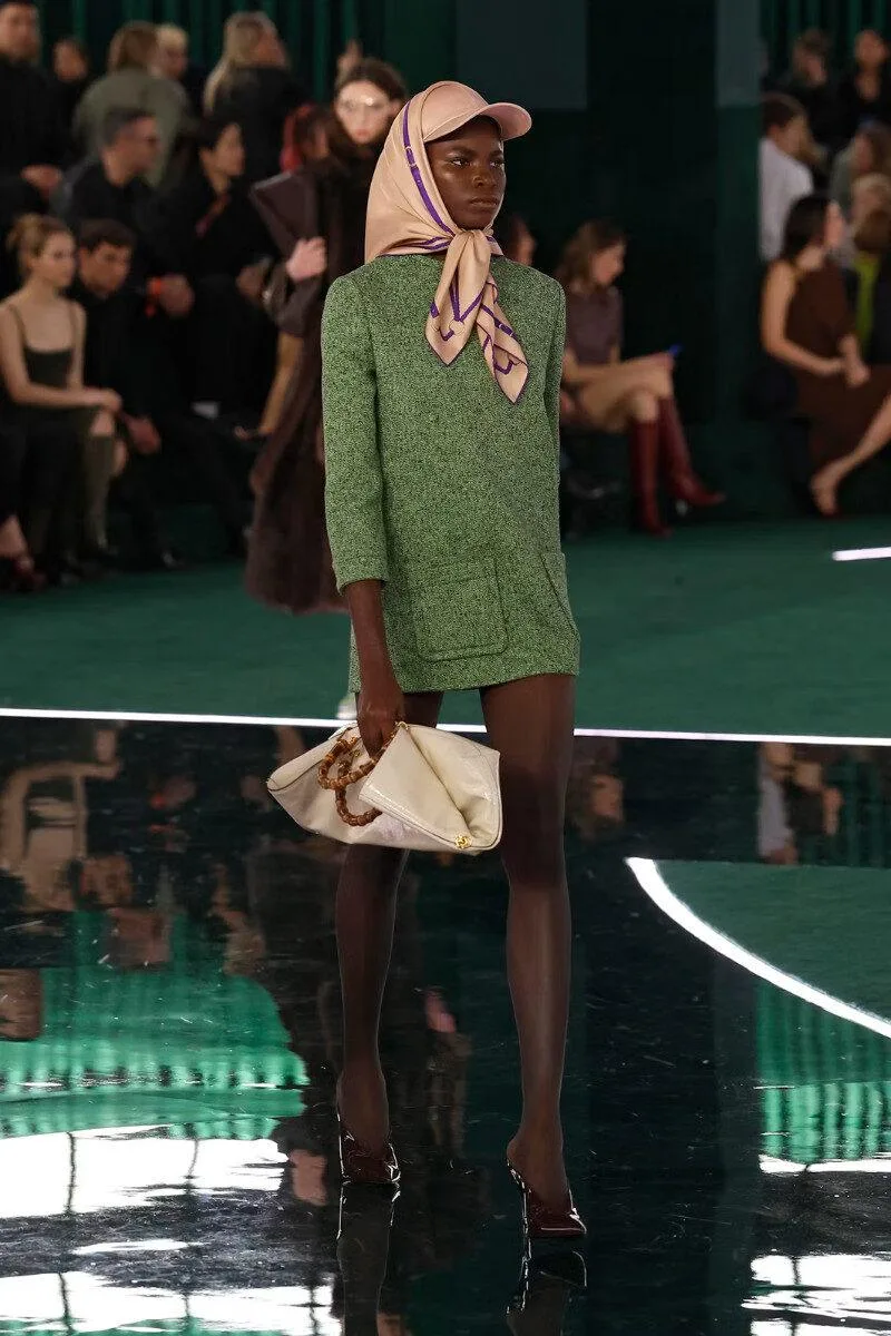 Milan Fashion Week 2025 scarves draped over baseball caps FallWinter Milan Fashion Week 2025 scarves draped over baseball caps FallWinter