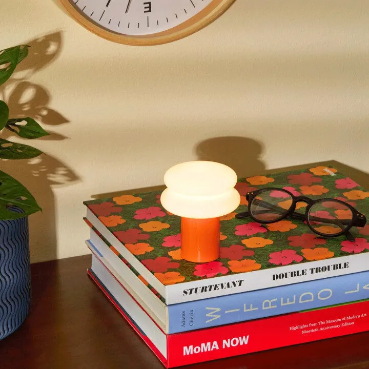 mini snowman lamp on desk