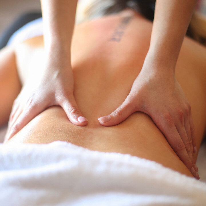 someone's back getting a massage