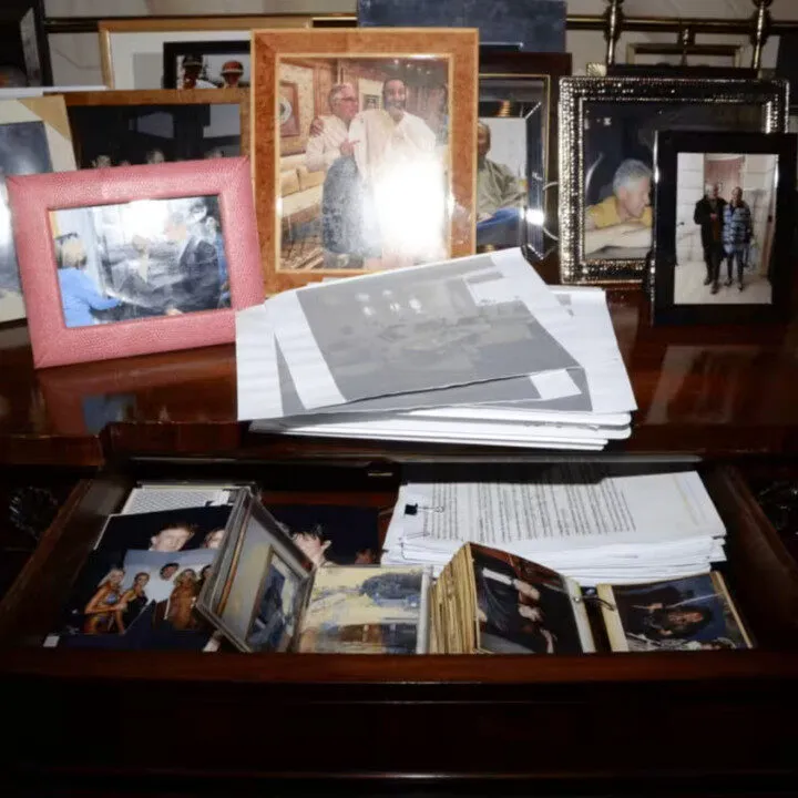 epstein files image of desk with photographs