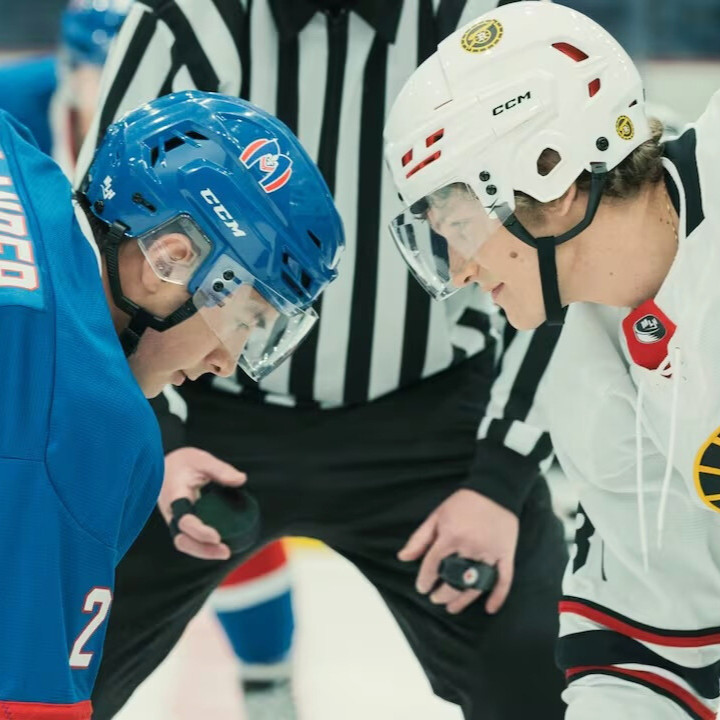 heated rivalry hudson williams and connor storrie playing hockey