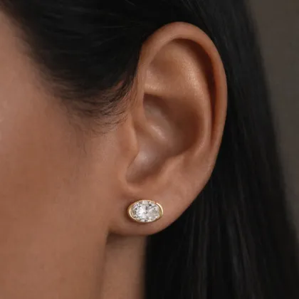 By Angi Oval Half Bezel Lab Grown Diamond Stud