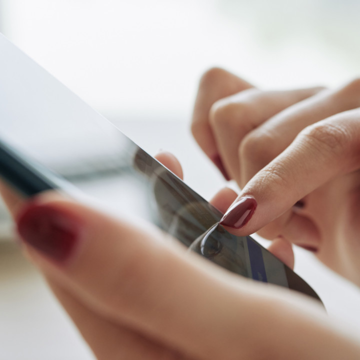 woman scrolling her phone